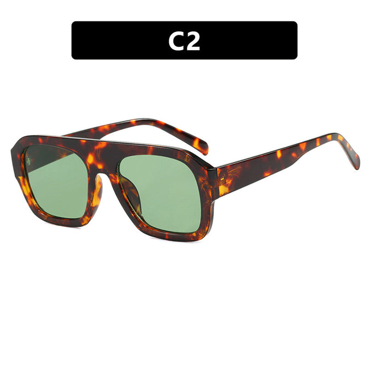 Dame oversized solbrille med markant rektangulært ramme Skanto
