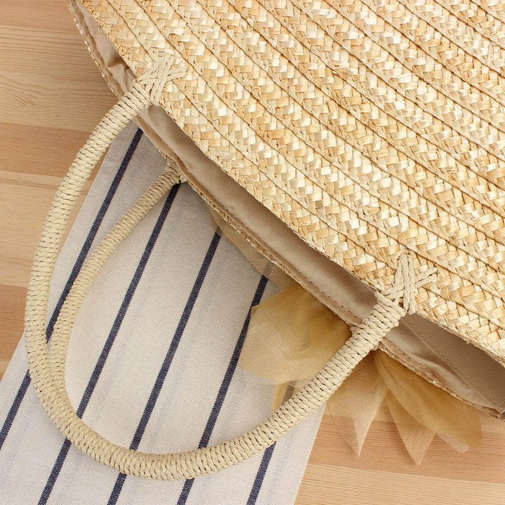 Elegant straw bag with floral accents Skanto