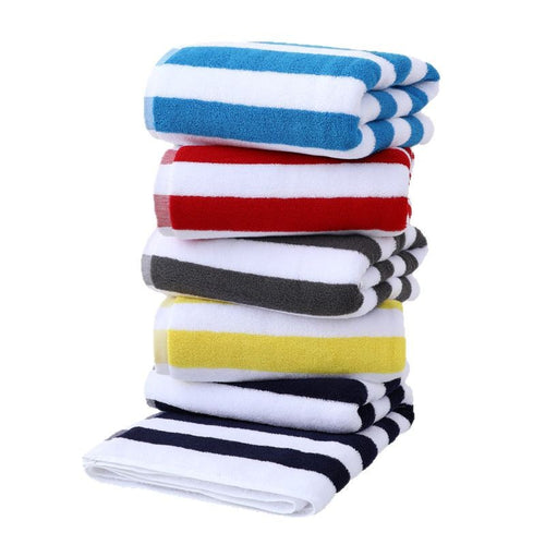 Luksuriøst strandhåndkle med elegant stripe mønster Skanto