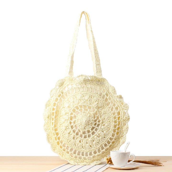 Hand-knotted beach bag with artistic round design Skanto