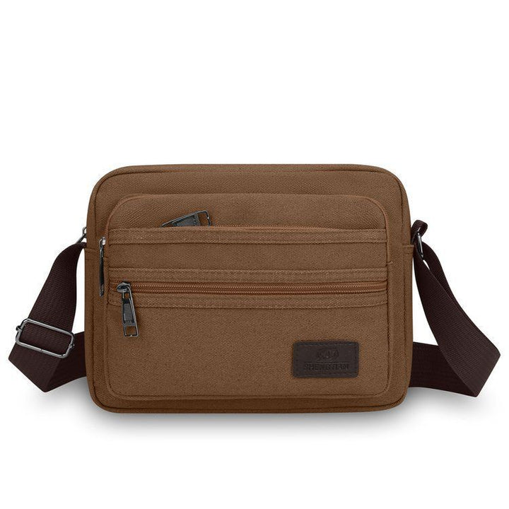 Umhengerbag med flere rom og justerbar skulderrem Skanto