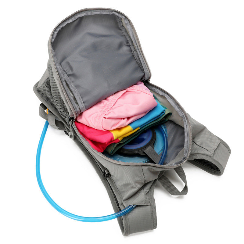 Unisex nan lett dagsryggsekk med drikkesystemkompatibilitet, pustende mesh-side lommer og elastisk snorlås Skanto
