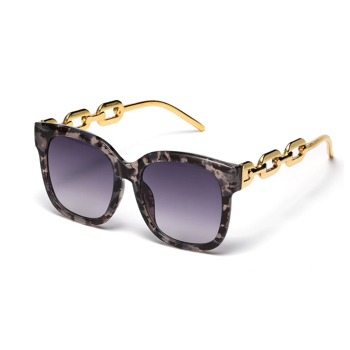 Dame moteriktig oversized solbrille med luksuriøs kjedeinnramming Skanto
