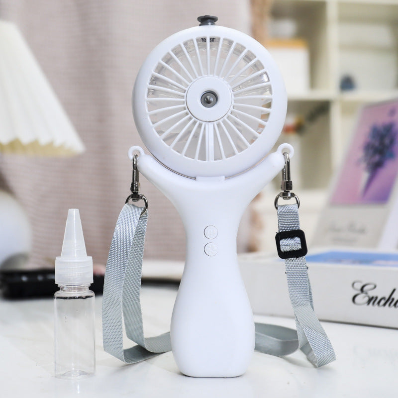 Dame bærbar håndvifte med ergonomisk design og sprayfunksjon Skanto
