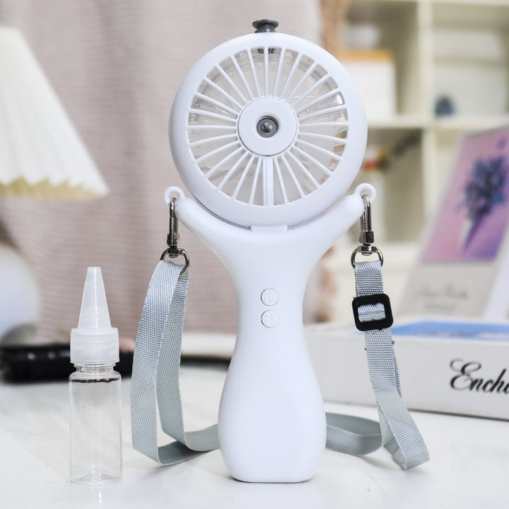 Dame bærbar håndvifte med ergonomisk design og sprayfunksjon Skanto