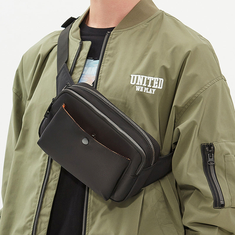 Lettvekt Multi-lomme Sling Bag Skanto