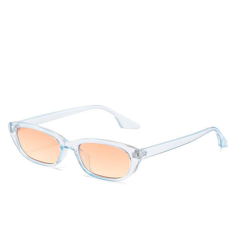 Dame moderne solbriller i trendy cat-eye-stil med gjennomsiktig ramme Skanto