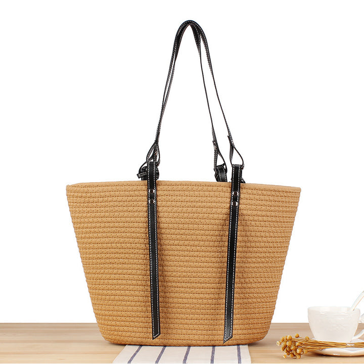 Elegant Beach Bag in Woven Natural Material with Stylish Leather Accents Skanto