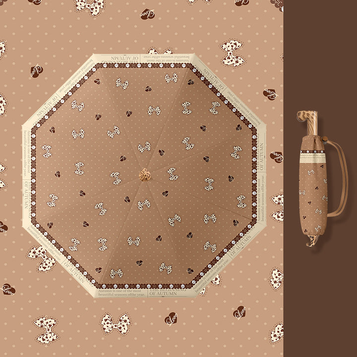 Dame faltparaply med lekent motiv Skanto