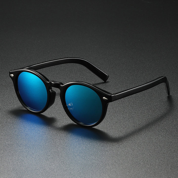 Dame Rund-solbrille med transparent ramme og reflekterende glass Skanto