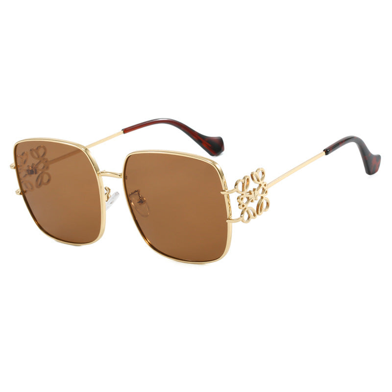 Women's square sunglasses with filigree design and luxurious metal frame Skanto