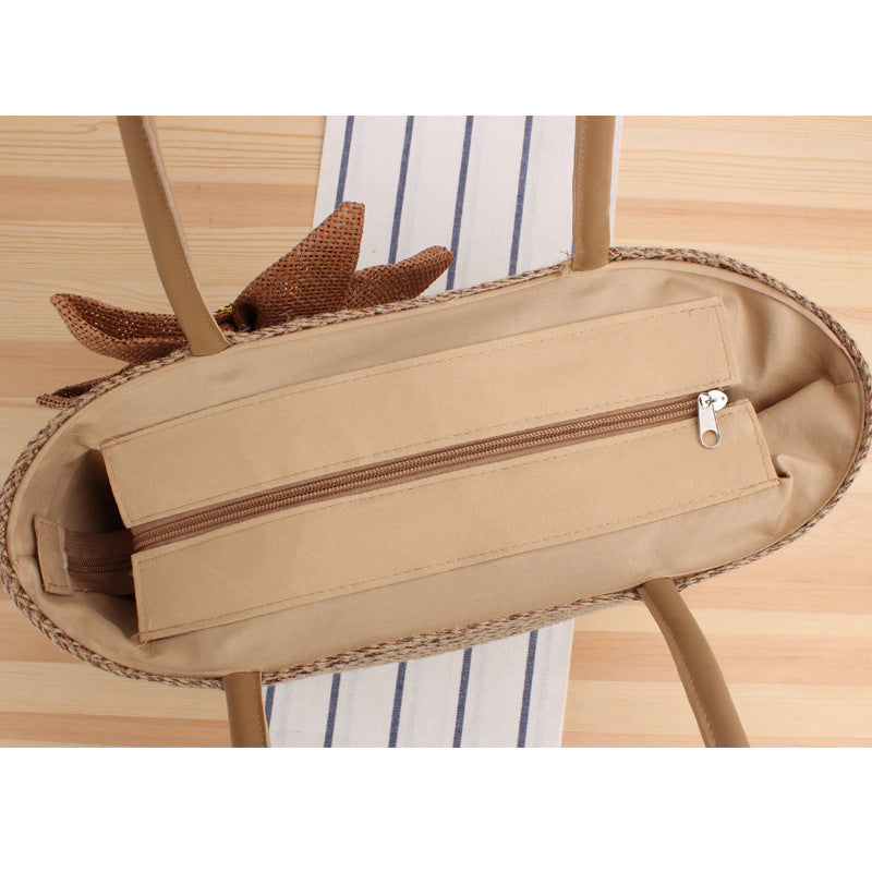 Handbag with floral appliqué in natural material Skanto