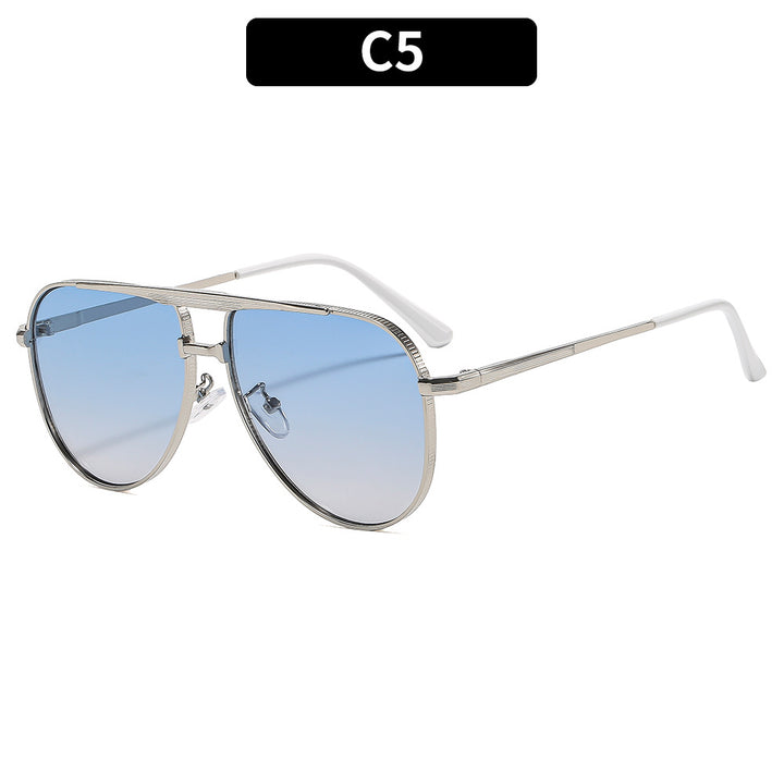 Dame modische Aviator-solbrille med elegant metallramme og UV400-beskyttelse Skanto