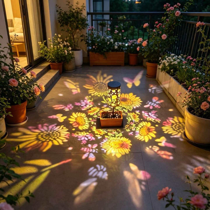 Solarlampe med solros blomster metall sylinder og hengende håndtak Skanto