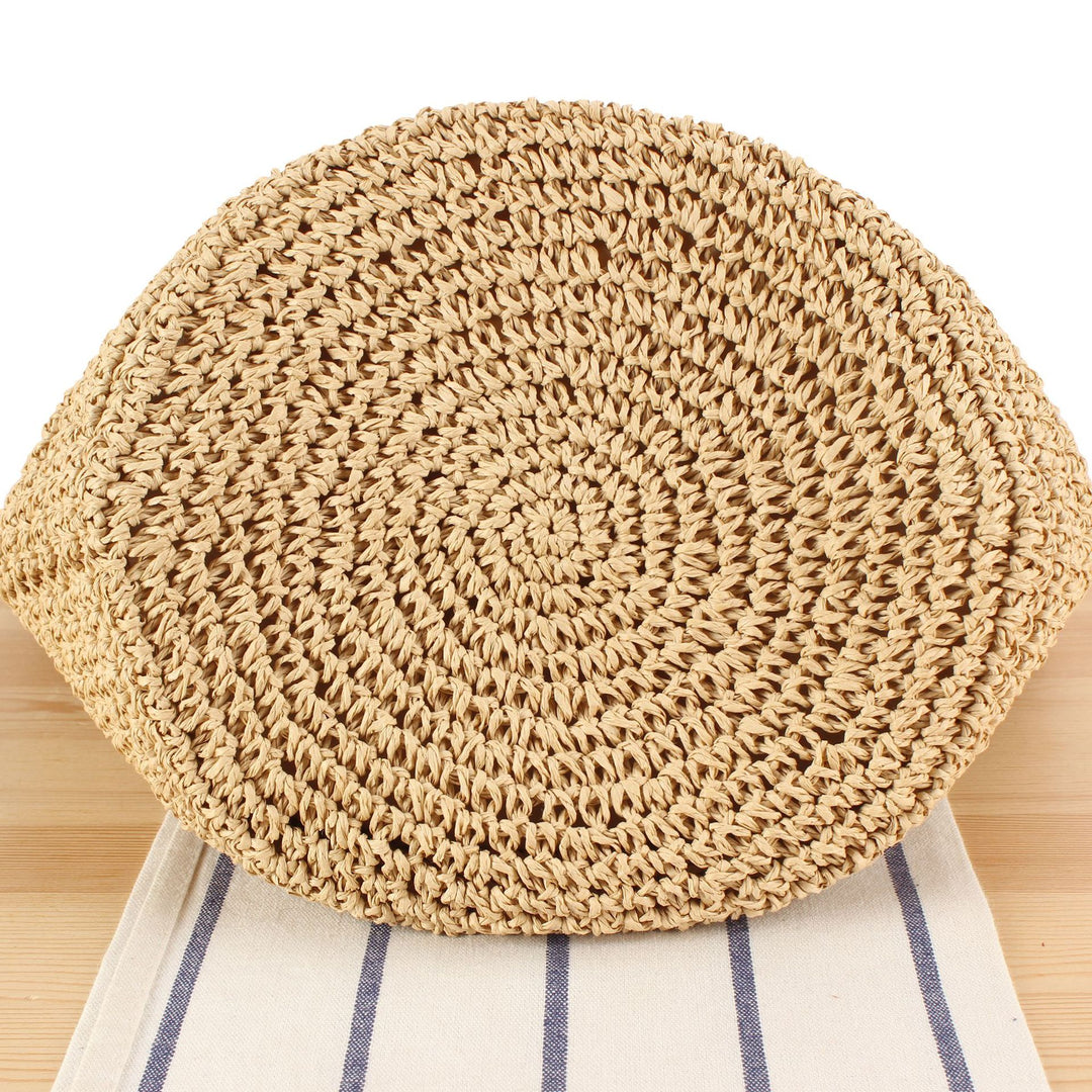 Hand-knotted beach bag with floral details Skanto