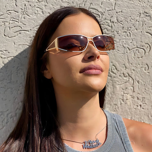 Damer Sporty Solbriller med elegant ramme Skanto