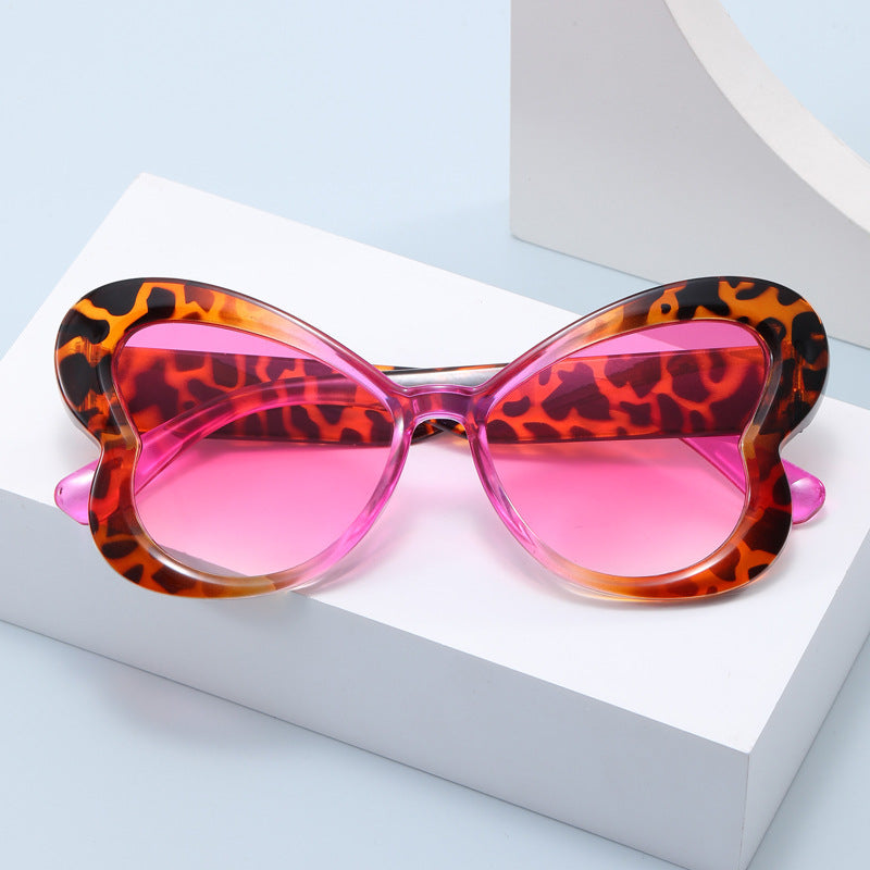 Dame Oversized-solbrille i leken sommerfugl-design Skanto