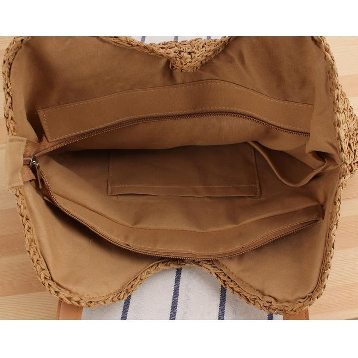 Large straw bag with leather accents Skanto