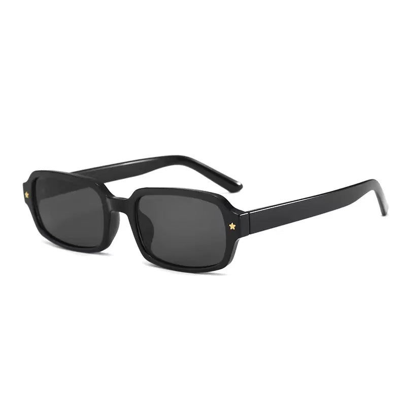 Dame designer solbriller i stilfullt skilpadde mønster Skanto