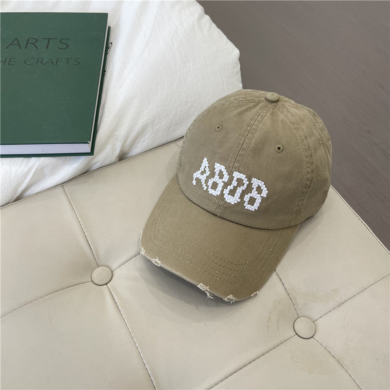 Kvinnens slitte bomull baseballcaps med grafisk detaljer Skanto