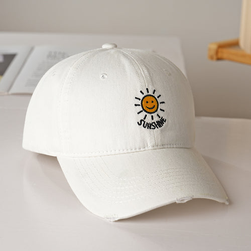 Dame sporty bomullslue med solbroderi Skanto