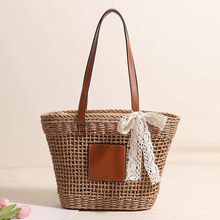 Handmade straw bag with elegant leather accents Skanto
