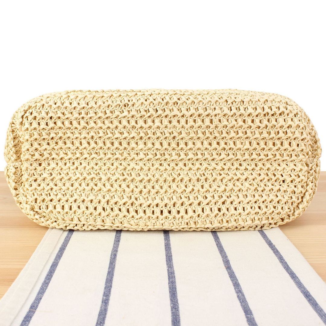 Handbag made of natural woven material with elegant leather straps Skanto