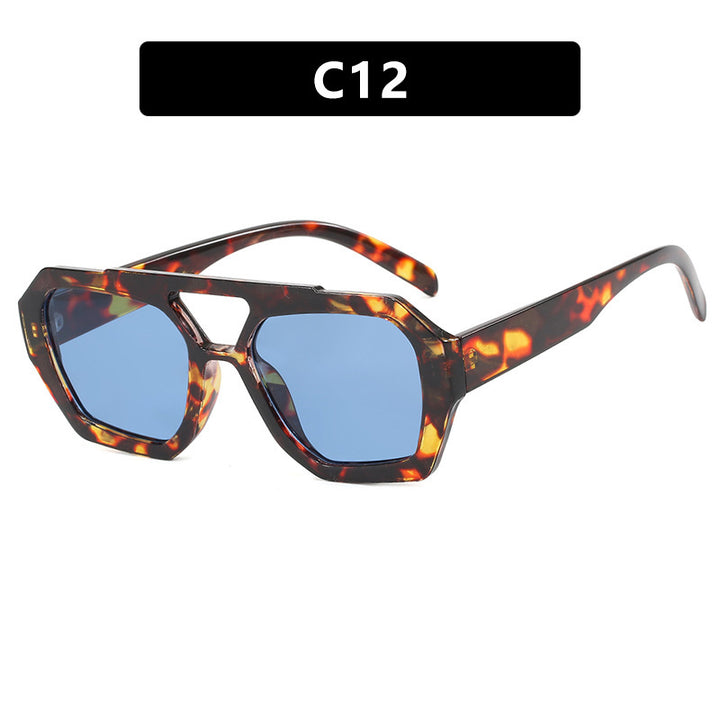 Dame oversized solbrille i markant, åttkantet design Skanto