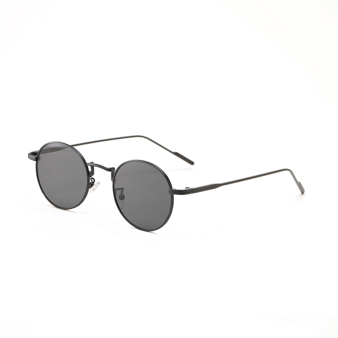 Dame rund modisk solbrille med elegant design Skanto
