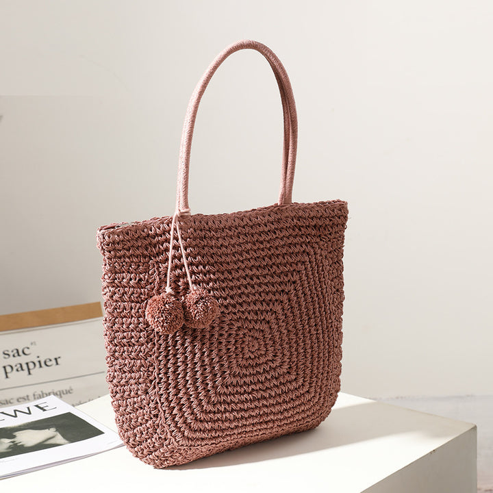 Handmade straw bag with pompom details Skanto