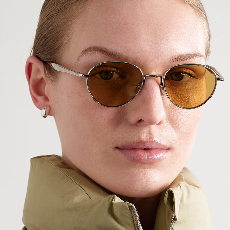 Dame runde solbriller med elegant metallramme og UV-beskyttelse Skanto