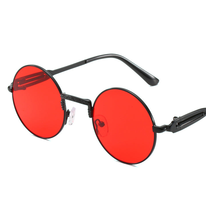 Dame rund modisk solbrille med fint metallramme Skanto