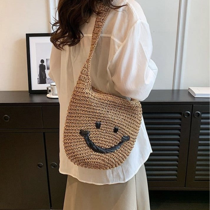 Håndveske med smilende motiv Skanto