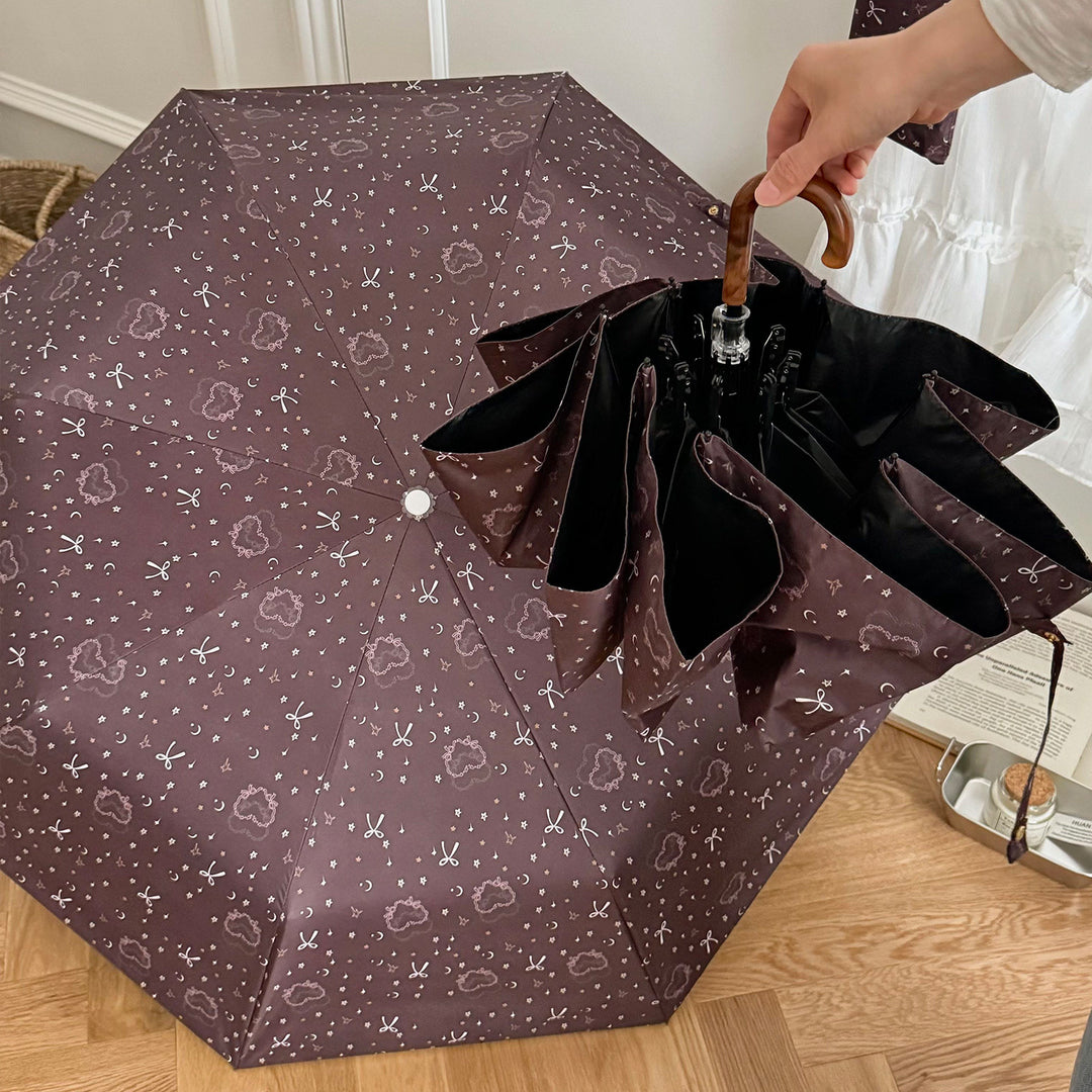 Dame sammenleggbart regnparaply med elegant anhengdesign Skanto