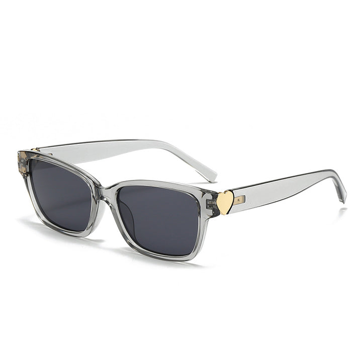 Dame moterik kvadratisk solbrille med hjerte-senter Skanto