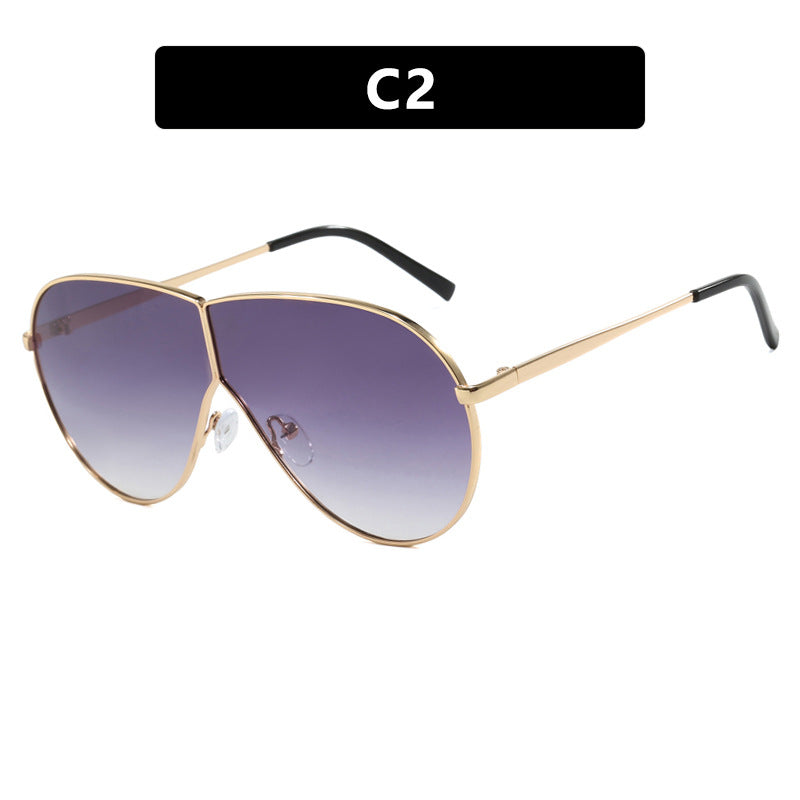 Women's pilot sunglasses with elegant gold frame and blue lenses Skanto