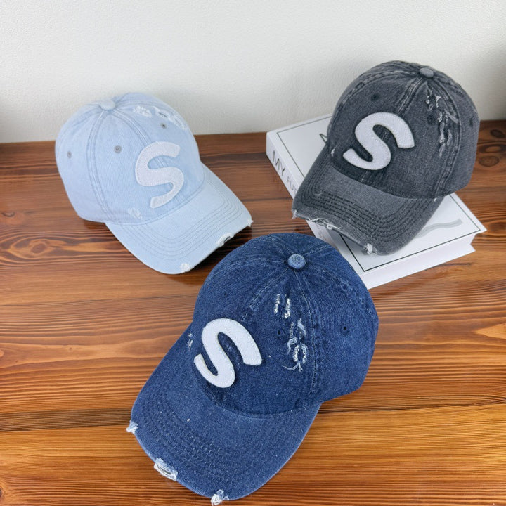 Kvinne's Slitt Grafisk Logo Baseball Cap Skanto