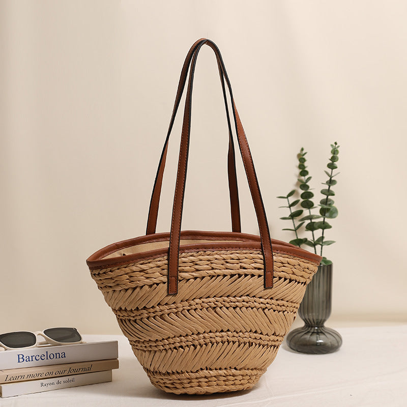 Braided basket bag with innovative leather handles Skanto