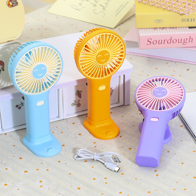 Dames bærbar USB håndvifte med innovativt smilendesign Skanto