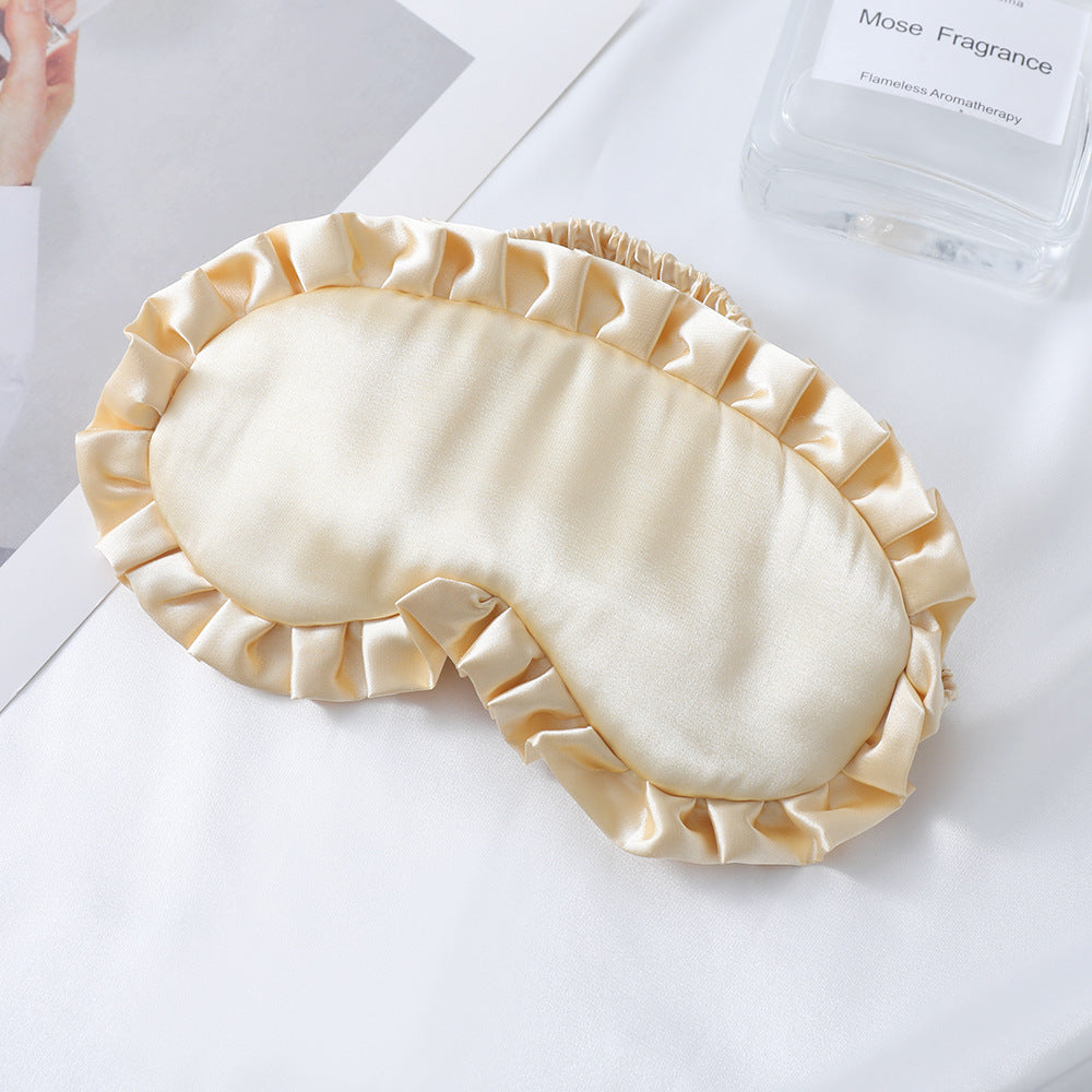 Dame nan satin-glinsende øyemaske med ergonomisk kontur, volangkant og myk polstring Skanto