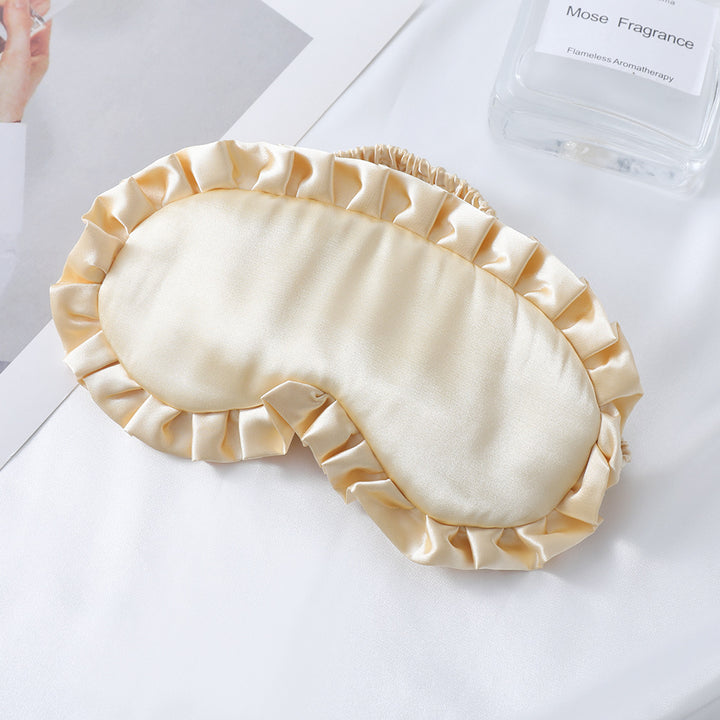 Dame nan satin-glinsende øyemaske med ergonomisk kontur, volangkant og myk polstring Skanto