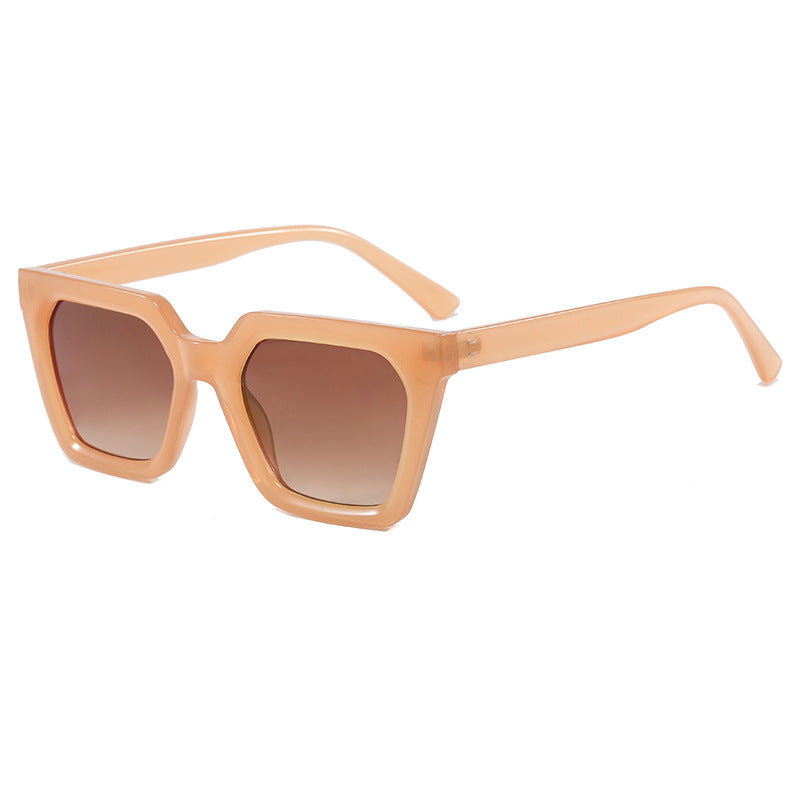 Dame moderne designer-solbrille med transparent ramme Skanto