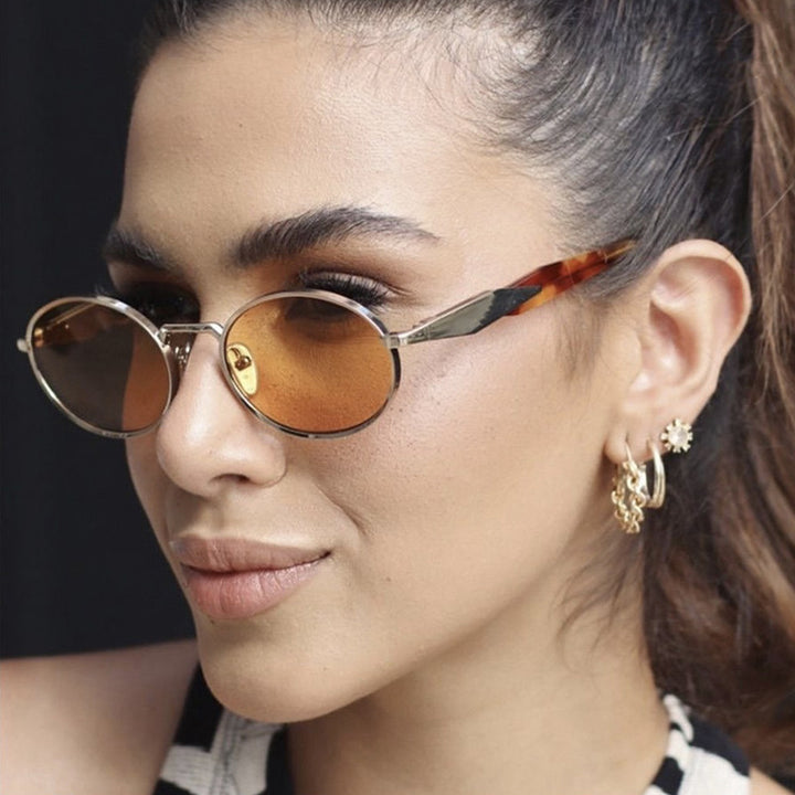 Women's designer sunglasses with unique oval frame and luxurious accents Skanto