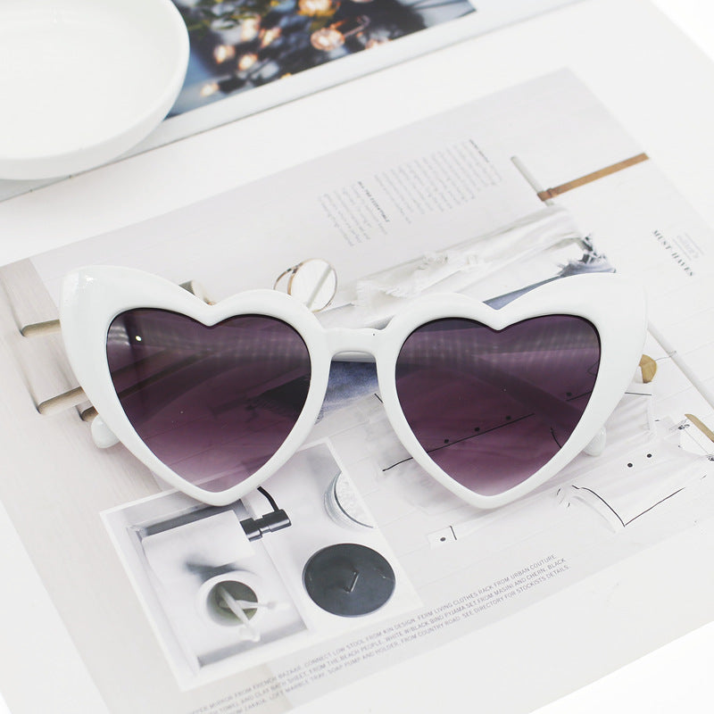 Dame hjerteformet solbrille med glitrende ramme Skanto