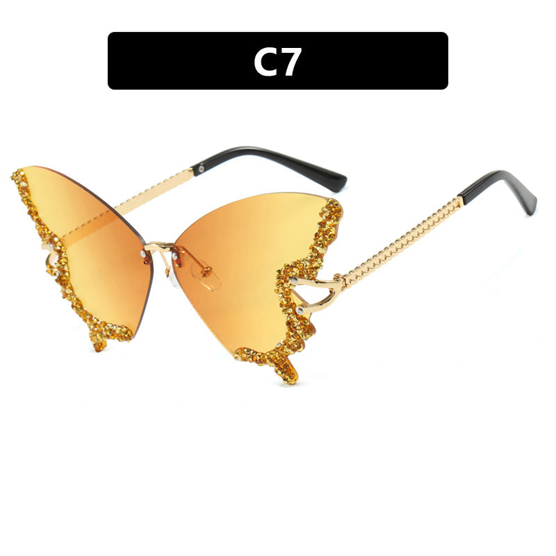 Women's large cat-eye sunglasses with sparkling rhinestone decoration and elegant frame Skanto