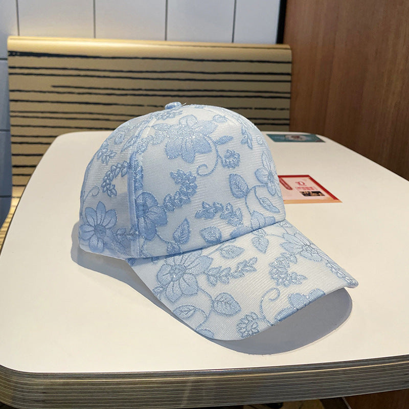 Kvinnens blomsterbroderte baseballcap Skanto