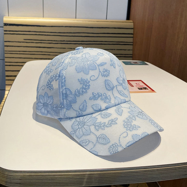 Kvinnens blomsterbroderte baseballcap Skanto