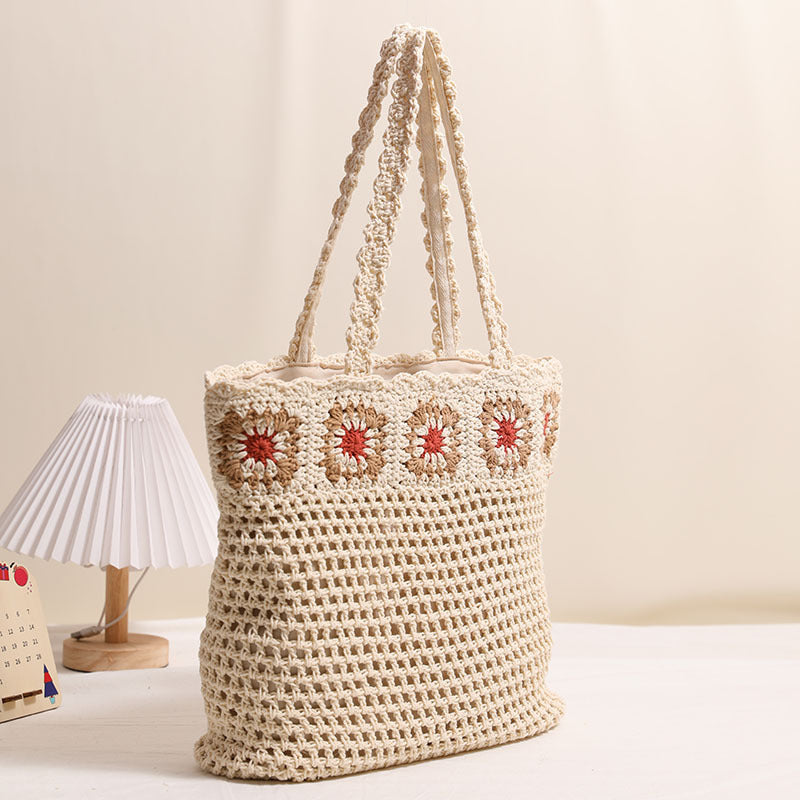 Hand-crocheted beach bag with floral accents Skanto