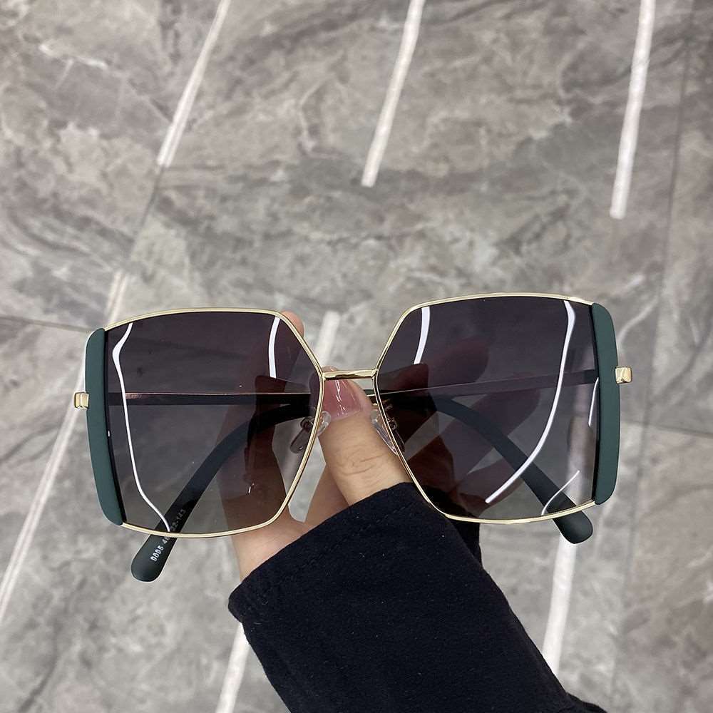 Dame oversized solbriller med glamorøs ramme Skanto