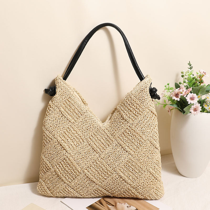 Braided shoulder bag made of natural materials Skanto